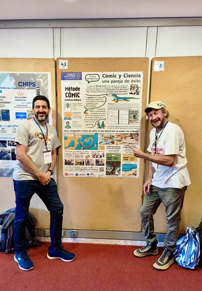 Miguel Ángel Miranda y Luis Resines, Pelopantón, junto al póster Cómic y Ciencia.